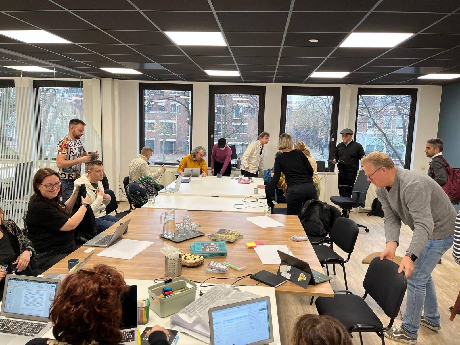 City teams working together around a table at a Culture Next SDG Lab session
